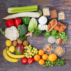 vegetables, greens, chicken breast, fish, cheese. healthy food, empty space. background for proper nutrition