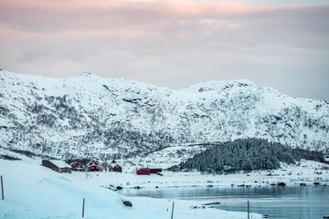 Sunny winter day in norwegian mountains and epic view, Norway.  Amazing landscape in Lofoten. Lovely clouds and blue sky.