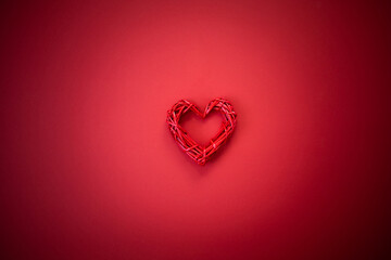 Red heart on a red background. Decor