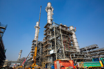 Fototapeta premium New construction Gas turbine electrical power plant crane during the current distribution