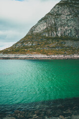 Stunning rough coast in Norway during autumn with pretty mountains