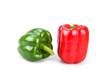 Green and red bell peppers isolated on white background