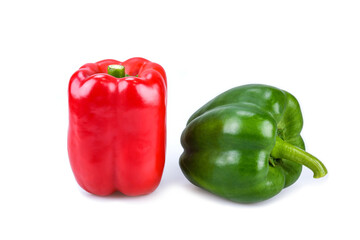 Green and red bell peppers isolated on white background