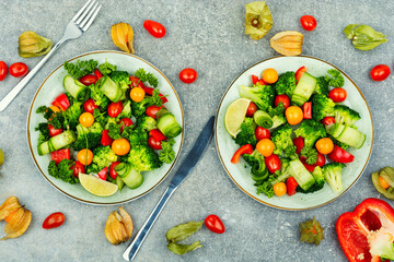 Healthy summer salad with physalis.