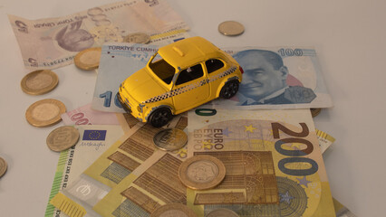 Turkish passport and a yellow taxi with a lot of money. Expensiveness of taxi