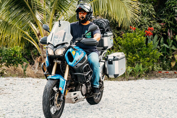Sekinchan, Malaysia - Oct 5, 2022 Adventure motorcycle traveler on the off road.