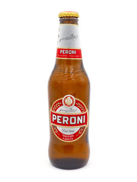 ROME, ITALY - JANUARY 24, 2023. Bottle of Peroni beer isolated on white background. Peroni Brewery is a brewing company, founded by Francesco Peroni in Vigevano, Italy in 1846.