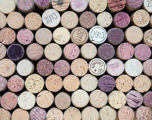 Closeup of a wall of used wine corks.