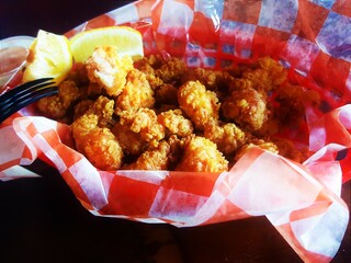 Alligator bites on a basket with lemon at the Everglades, Florida