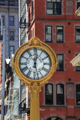 Fototapeta na wymiar old clock on the fifth avenue street in the New York city, USA