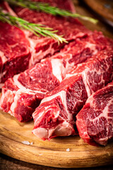 Chopped raw beef on a cutting board. 