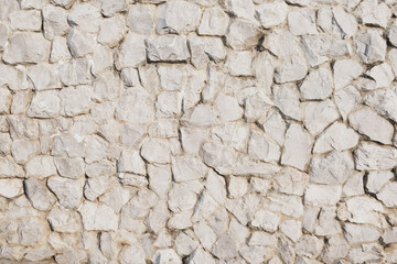 masonry wall texture. stones and rocks of different shape background