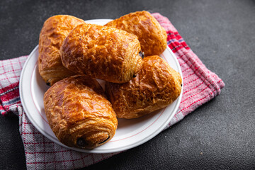 puff buns fresh bakery chocolate filling meal food snack on the table copy space food background rustic top view