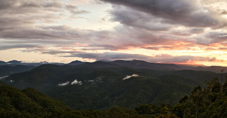 morning scene of hills, clouds and peaceful sunrise sky background in Da Lat highland, Vietnam