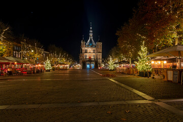 Fototapeta na wymiar City scenic from Deventer at night in christmas time in the Netherlands