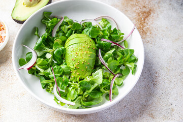 avocado salad green leaves mix meal food snack on the table copy space food background rustic top view