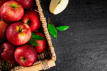 Ripe red apples in a basket. 