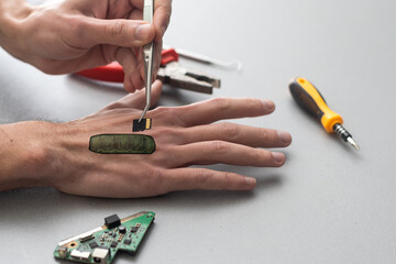 Human robotic hand in futuristic concept