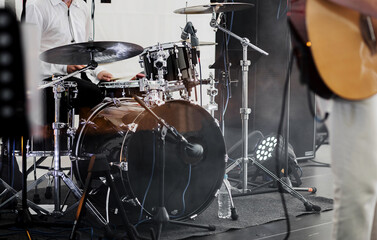 Fototapeta na wymiar Playing drums on stage