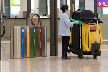  Cleaning staff at Terminal airport hall, Hong Kong.