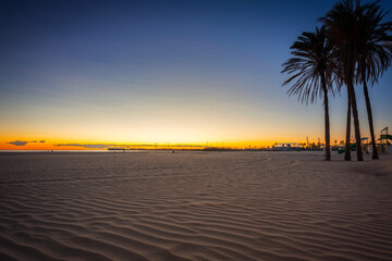 Playa de las Arenas beach by the Mediterranean Sea in Valencia at sunrise. Spain