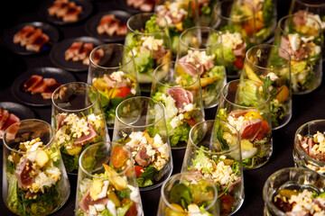 Catering plate. Assortment of snacks on the buffet table.