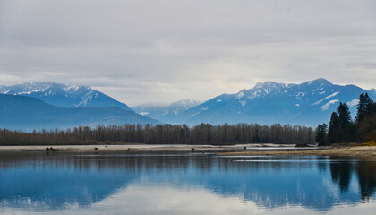 Mountains Reflected in the Fraser River in British Columbia Canada