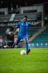 Vertical Shot of Major League Soccer Football Championship. Confident Blue Team African Forward...