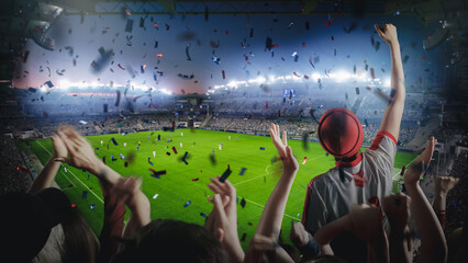 Establishing Shot of Fans Cheer for Their Favorite Team on a Stadium During Soccer Championship...