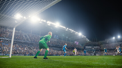 Football Championship: White Team Forward Hits the Ball and Scores Perfect Goal. Goalkeeper Jumps, Fails to Catch, Protect Goals. Crowd of Fans Cheers. Beautiful Cinematic Edit.