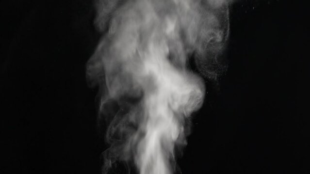 Abstract white smoke in motion. Smoke, Cloud of particle fog in light spot background. Light, white, fog, cloud, black background, 4k, Floating smoke cloud.