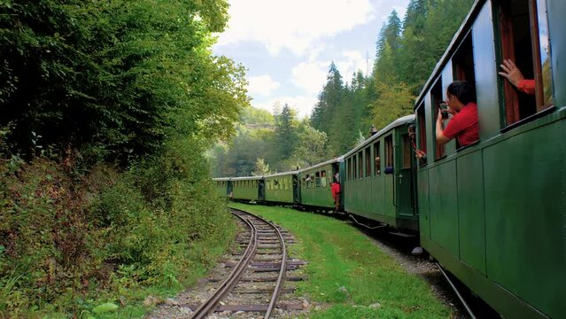 Tourist Taking Picture Of Vintage Train In The Nature