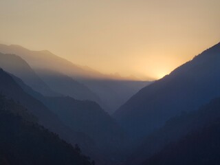 Himachal, India - June 6th, 2022 : Mountain valley during sunrise. Natural summer landscape