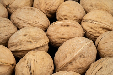 Pile of raw walnuts texture