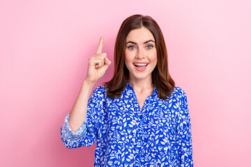 Photo of funny excited lady wear print shirt pointing finger smiling isolated pink color background