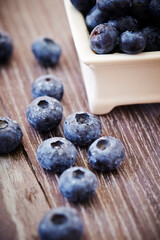 fresh blueberries on wooden background	