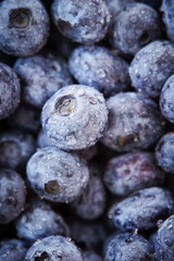 Close-up of fresh blueberries with water droplets