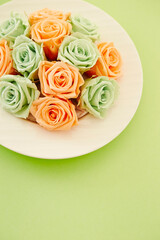 Dried flowers on a plate, preserved roses