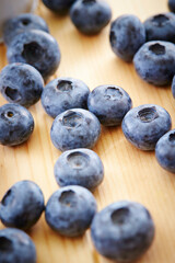 blueberries on wooden background