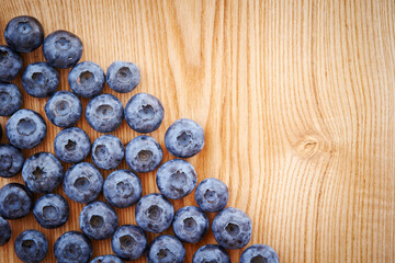 fresh blueberries on wooden background