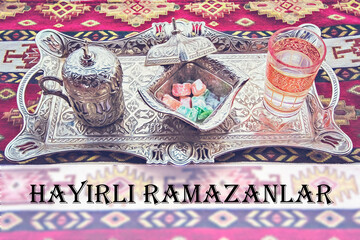 Turkish coffee with sweets on silver tray Hayirli Ramazanlar greeting