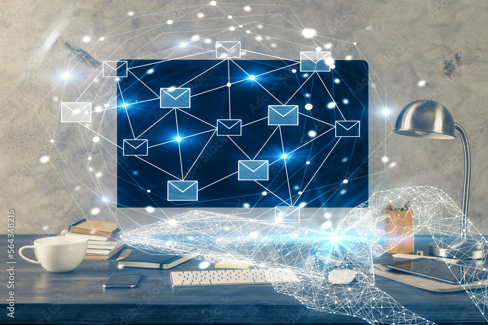 Poster desktop computer background in office and flying envelops hologram drawing. multi exposure. electron