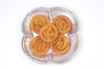 Indian sweet food jalebi or imrati on a plate
