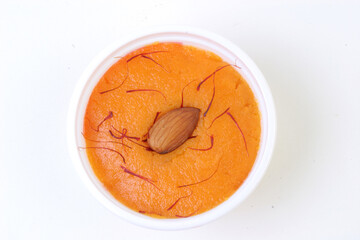 Halwa with garnish in the round with background
