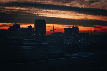 Sunset in a residential area of St. Petersburg with a view of the business skyscraper