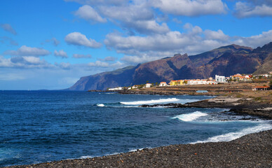 View of the ocean coastline and cliffs of Los Gigantes in the distance from Alcala,Tenerife,Canary...
