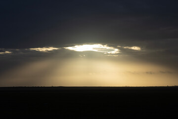 The sight of rays of sun piercing through the clouds is a breathtaking and awe-inspiring spectacle.