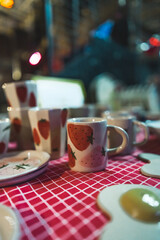 Handcrafted painted ceramic cups at handcraft market. High quality photo