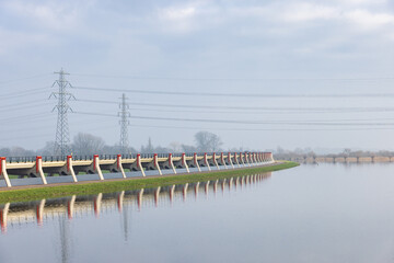 Bridge, inlet to high water area and water barrier Tollbrug at IJsseldike in Markluiden...