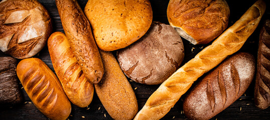 Different types of fresh crispy bread. 